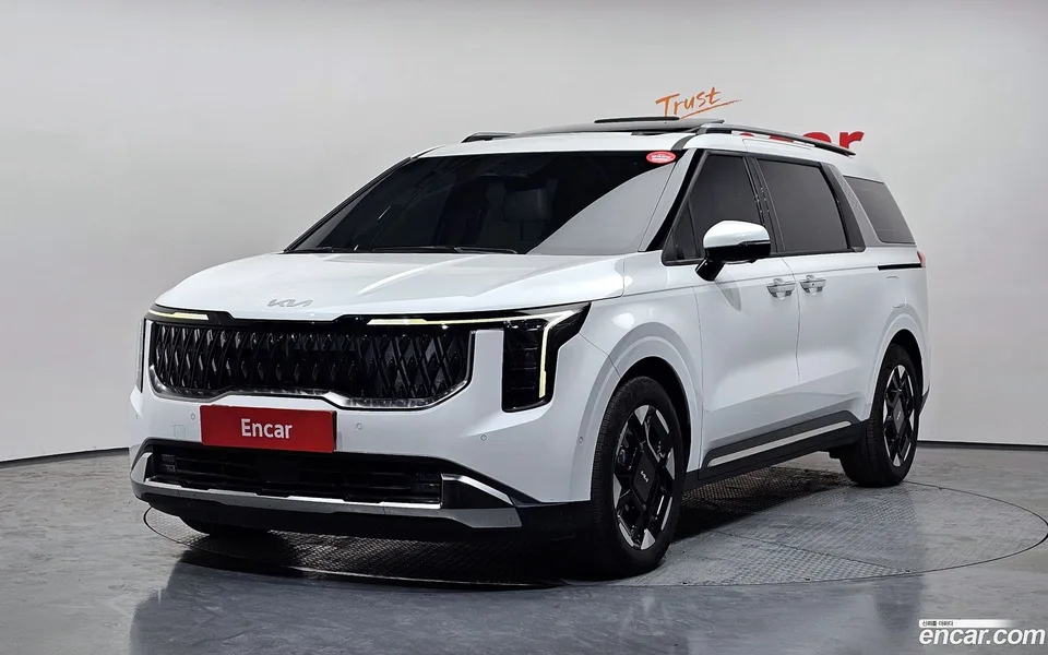 Kia Carnival HEV 9 2024 — photo 1, buy with delivery to Moscow