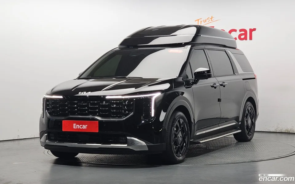 Kia Carnival HEV 9 2024 — фото 1, купить с доставкой в Москву