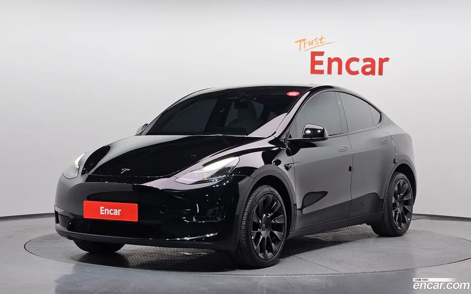 Tesla Model Y AWD 2024 — фото 1, купить с доставкой в Москву