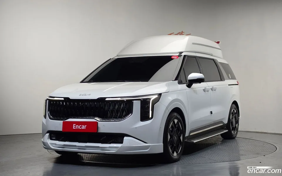 Kia Carnival HEV 9 () 2024 — photo 1, buy with delivery to Moscow