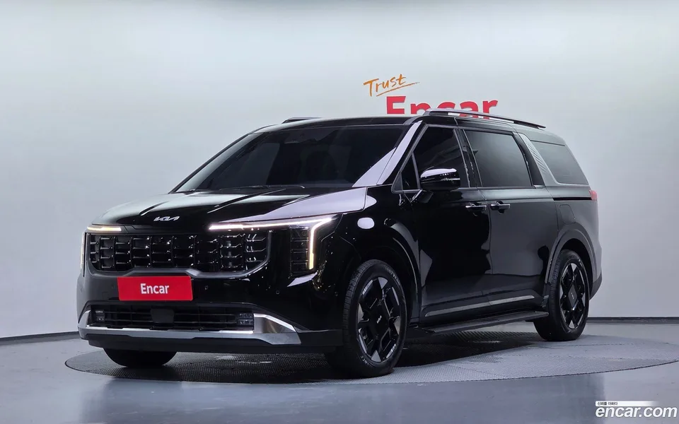 Kia Carnival HEV 7 2025 — photo 1, buy with delivery to Moscow