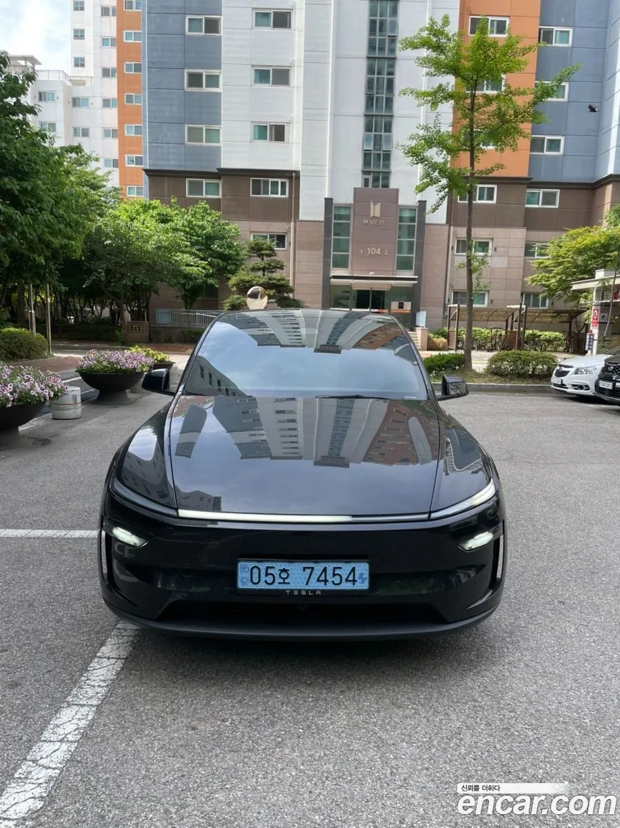 Tesla Model Y AWD 2026 — photo 1, buy with delivery to Moscow