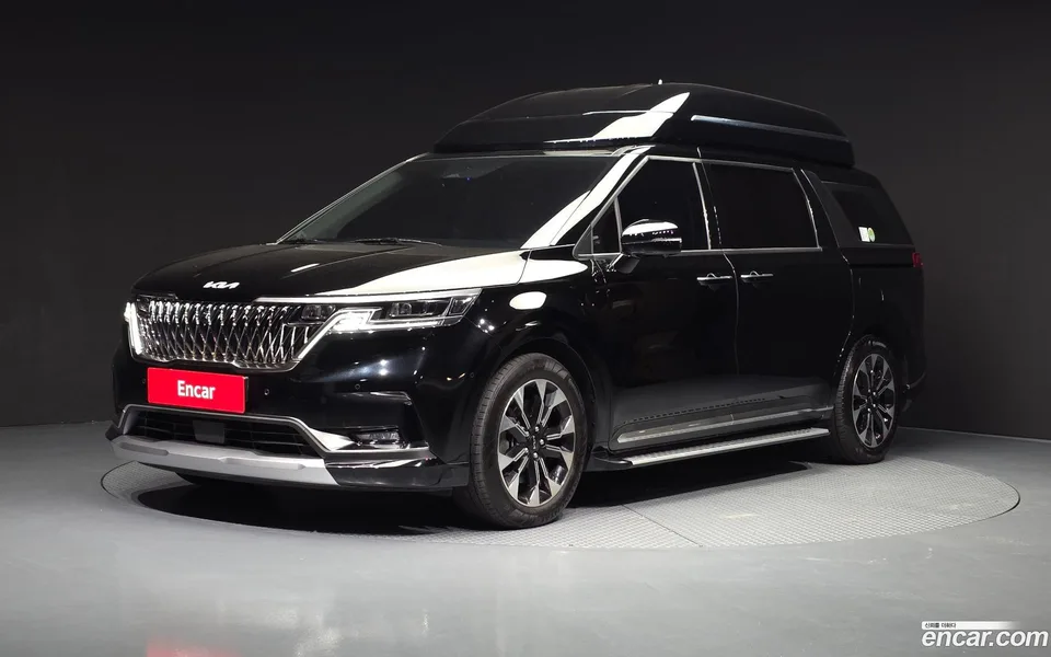 Kia Carnival 7 2023 — photo 1, buy with delivery to Moscow