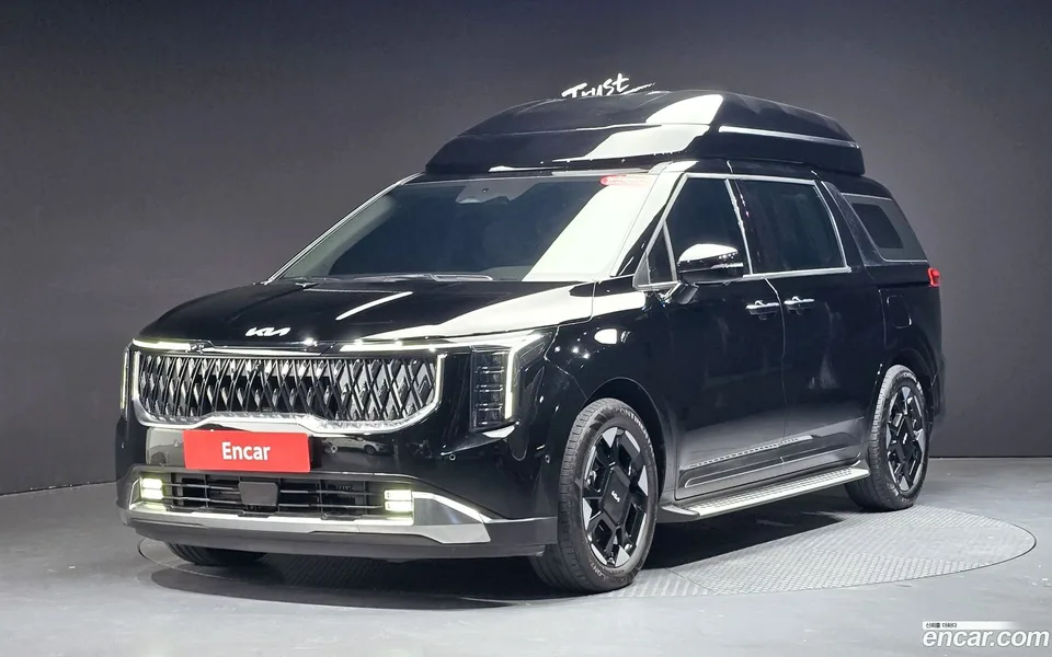 Kia Carnival HEV 9 2024 — photo 1, buy with delivery to Moscow