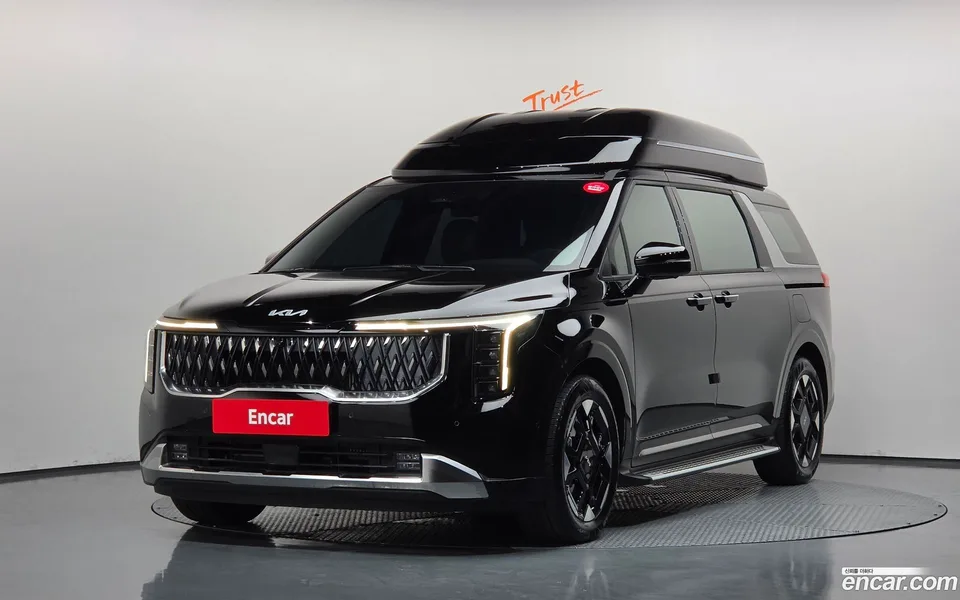 Kia Carnival HEV 7 2024 — фото 1, купить с доставкой в Москву