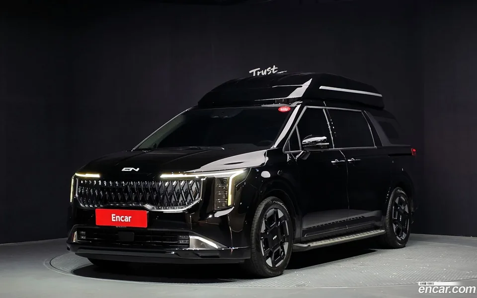 Kia Carnival HEV 7 () 2024 — photo 1, buy with delivery to Moscow