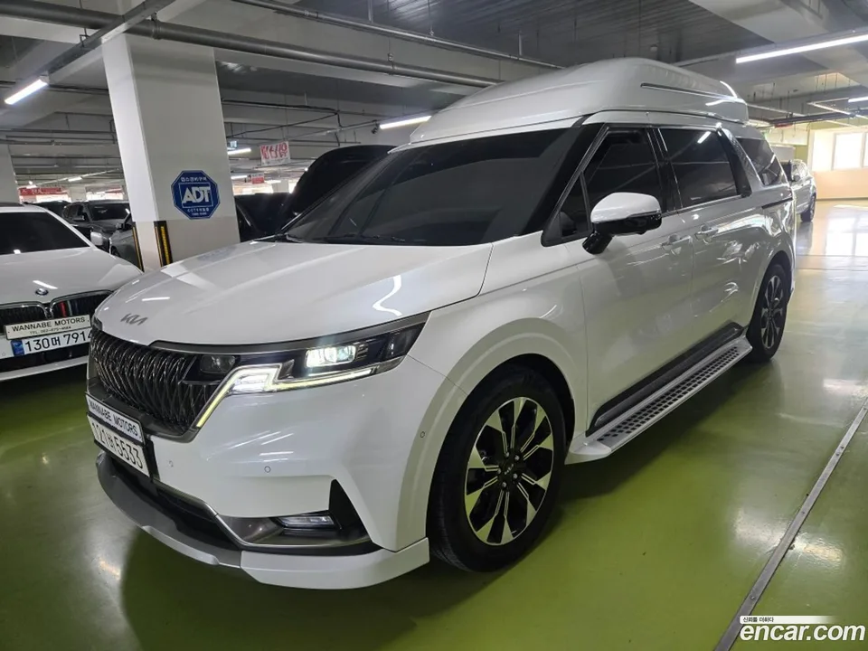 Kia Carnival 9 2023 — photo 1, buy with delivery to Moscow
