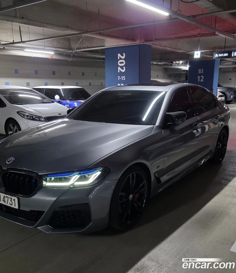BMW 5 Series M550i xDrive 2023 — photo 1, buy with delivery to Moscow