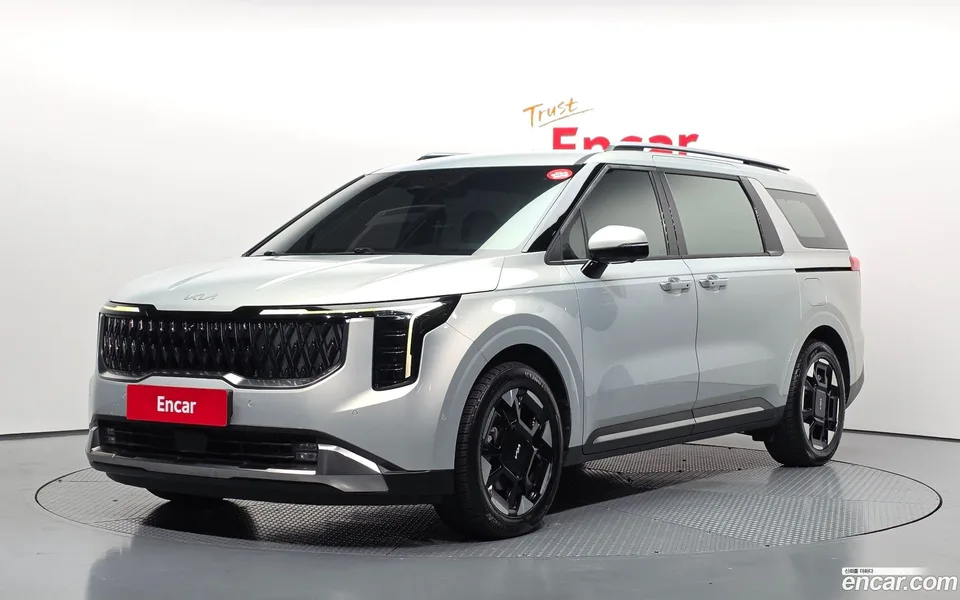Kia Carnival HEV 7 2024 — photo 1, buy with delivery to Moscow