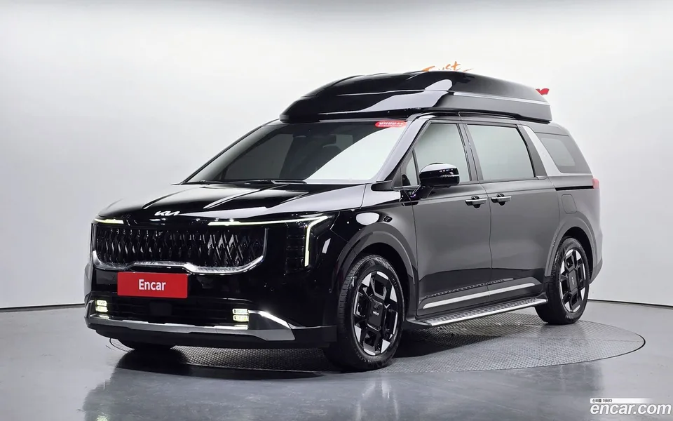 Kia Carnival HEV 7 2024 — фото 1, купить с доставкой в Москву