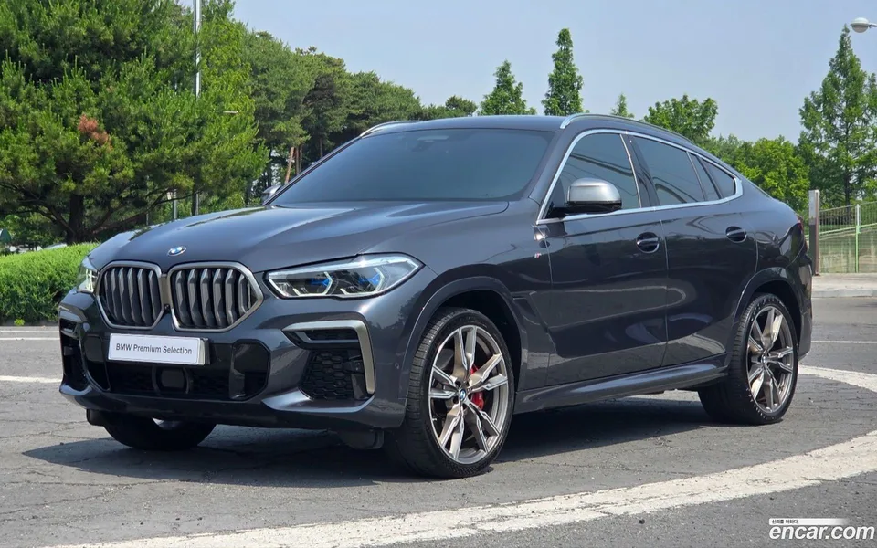 BMW X6 M50i 2022 — photo 1, buy with delivery to Moscow