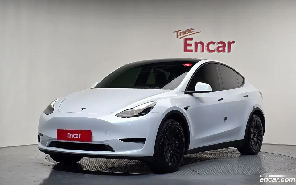 Tesla Model Y RWD 2023 — photo 1, buy with delivery to Moscow