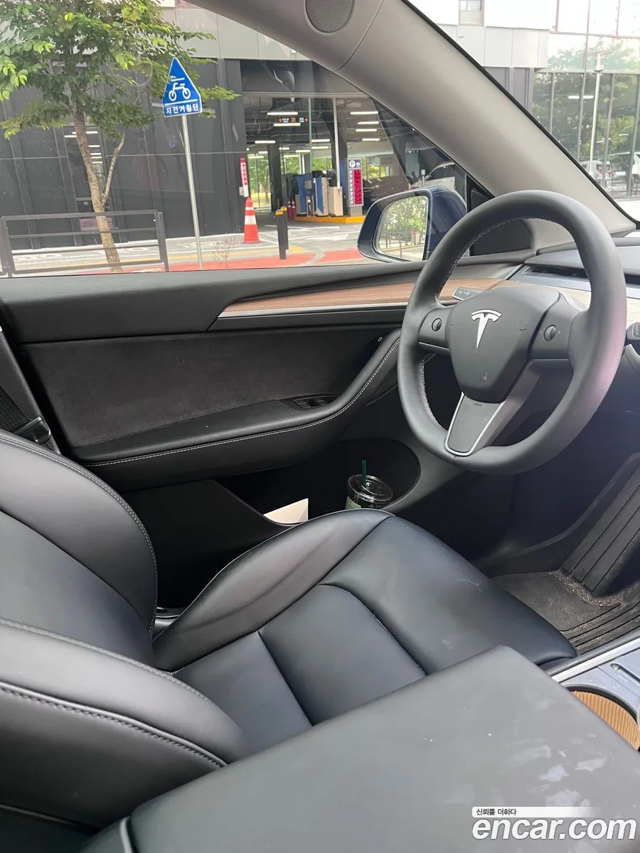 Tesla Model Y RWD 2023 — photo 1, buy with delivery to Moscow