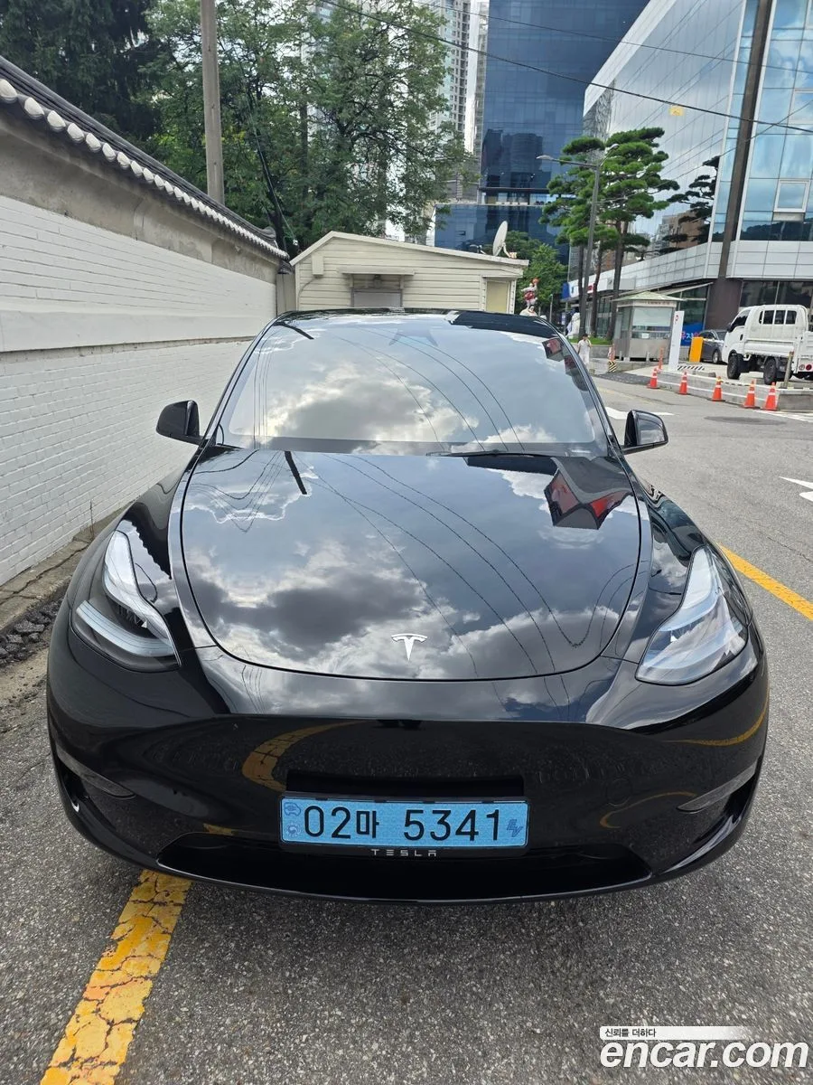 Tesla Model Y AWD 2024 — photo 1, buy with delivery to Moscow