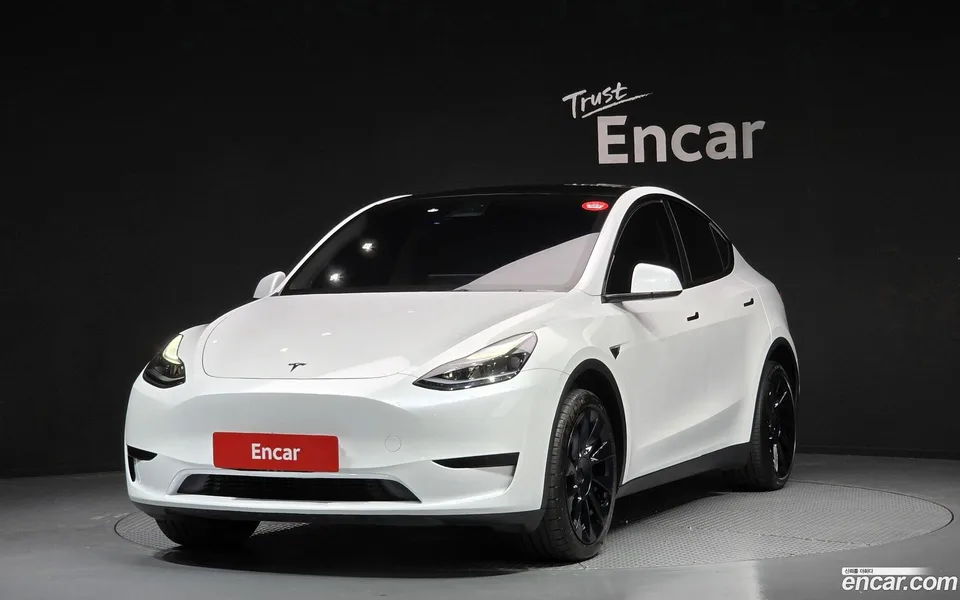 Tesla Model Y RWD 2023 — photo 1, buy with delivery to Moscow
