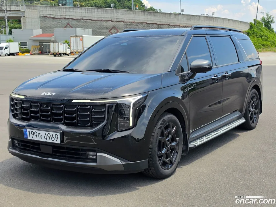 Kia Carnival 7 2024 — photo 1, buy with delivery to Moscow