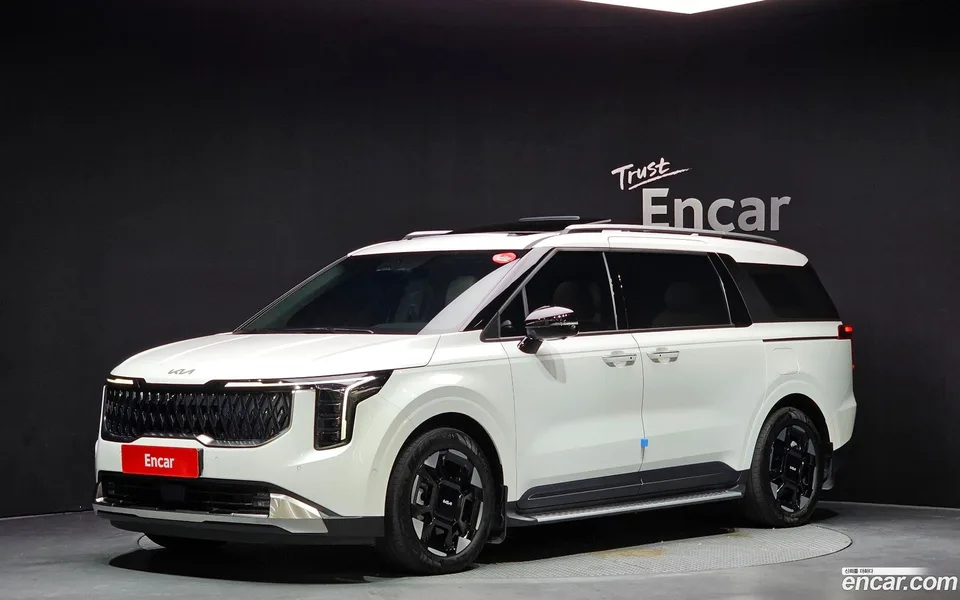 Kia Carnival HEV 7 2024 — photo 1, buy with delivery to Moscow