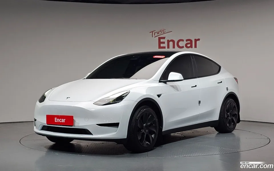 Tesla Model Y RWD 2023 — photo 1, buy with delivery to Moscow