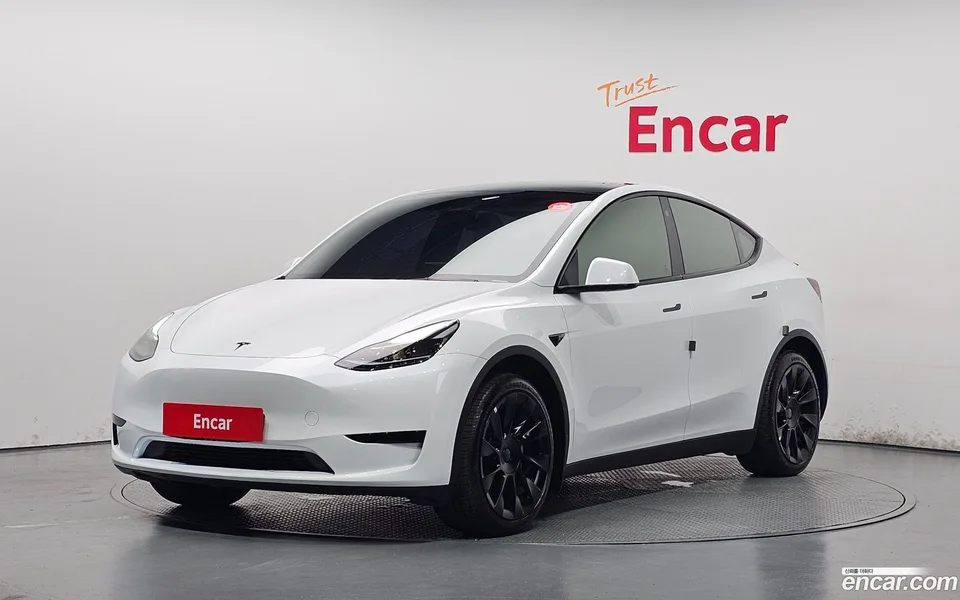 Tesla Model Y RWD 2023 — photo 1, buy with delivery to Moscow