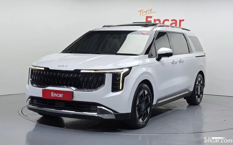 Kia Carnival 7 2024 — photo 1, buy with delivery to Moscow