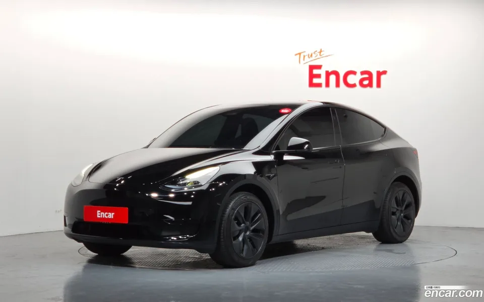 Tesla Model Y RWD 2024 — photo 1, buy with delivery to Moscow