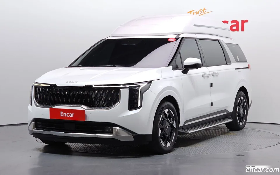 Kia Carnival HEV 9 2024 — photo 1, buy with delivery to Moscow