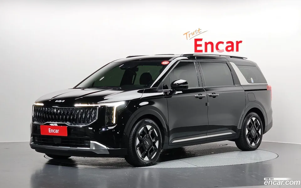 Kia Carnival HEV 9 2024 — photo 1, buy with delivery to Moscow