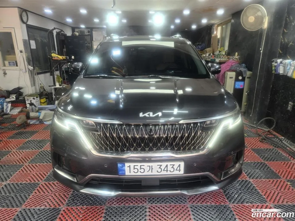 Kia Carnival 7 2023 — photo 1, buy with delivery to Moscow