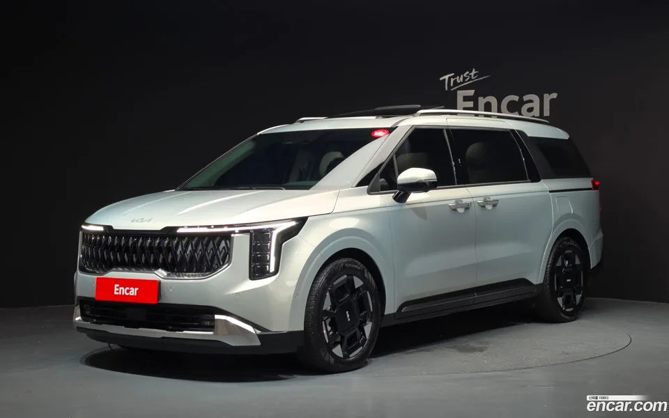 Kia Carnival HEV 7 2024 — photo 1, buy with delivery to Moscow