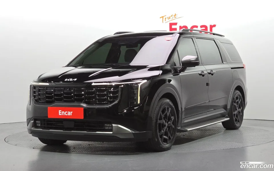 Kia Carnival HEV 7 2024 — photo 1, buy with delivery to Moscow