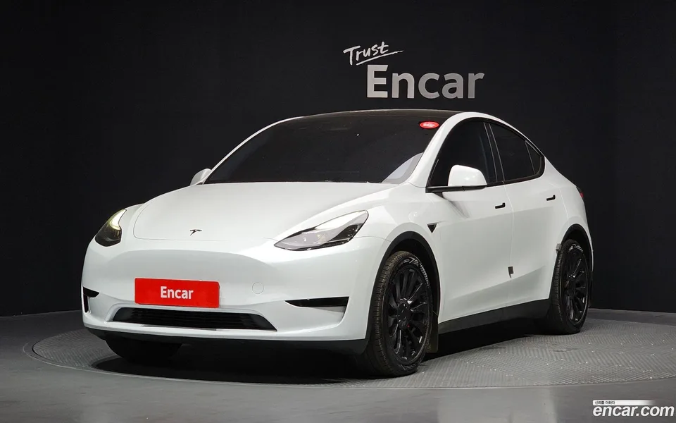 Tesla Model Y RWD 2024 — photo 1, buy with delivery to Moscow