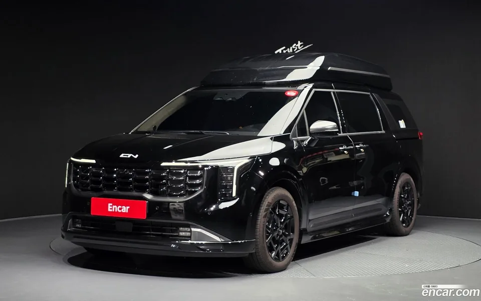 Kia Carnival HEV 9 () 2025 — photo 1, buy with delivery to Moscow