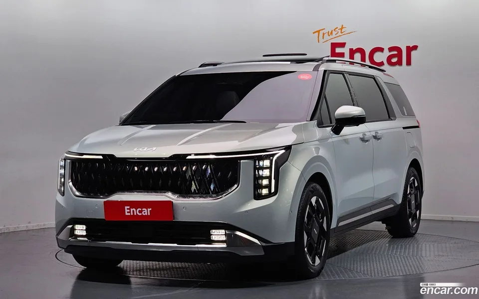 Kia Carnival HEV 7 2024 — photo 1, buy with delivery to Moscow