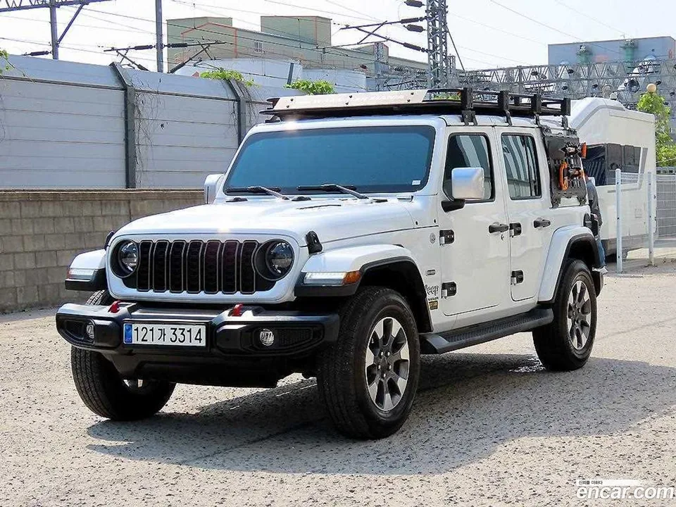 Jeep Wrangler 2.0 4 2023 — photo 1, buy with delivery to Moscow