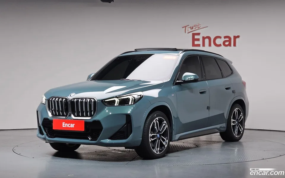 BMW iX1 xDrive 30 M 2023 — photo 1, buy with delivery to Moscow