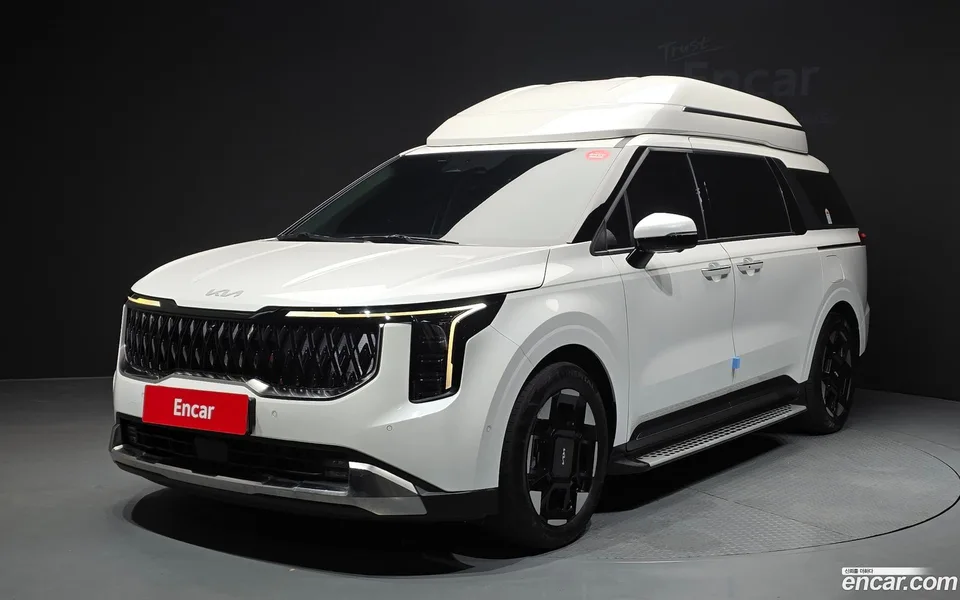 Kia Carnival 7 2024 — photo 1, buy with delivery to Moscow