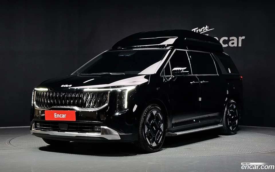 Kia Carnival 7 2024 — photo 1, buy with delivery to Moscow
