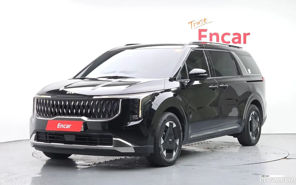 Kia Carnival HEV 9 2024 — photo 1, buy with delivery to Moscow