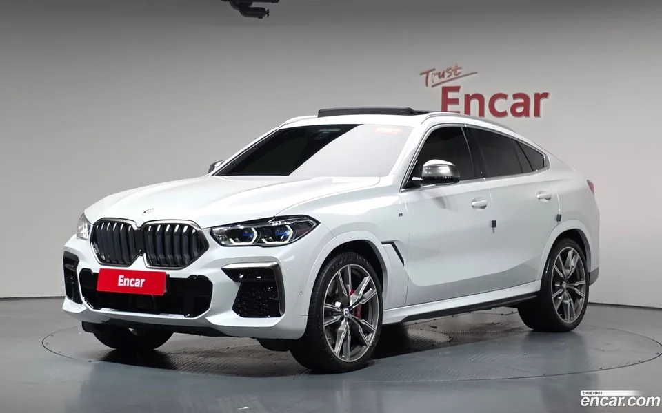 BMW X6 M50i 2022 — photo 1, buy with delivery to Moscow