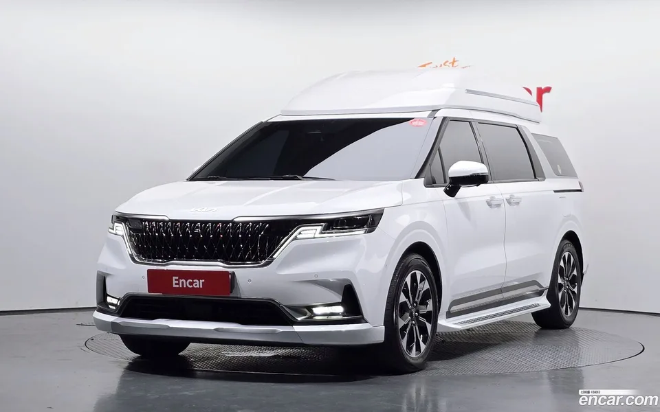 Kia Carnival 7 2023 — photo 1, buy with delivery to Moscow