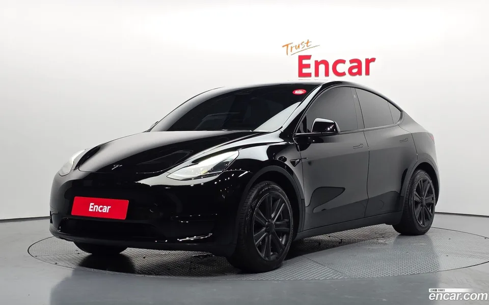 Tesla Model Y RWD 2023 — photo 1, buy with delivery to Moscow