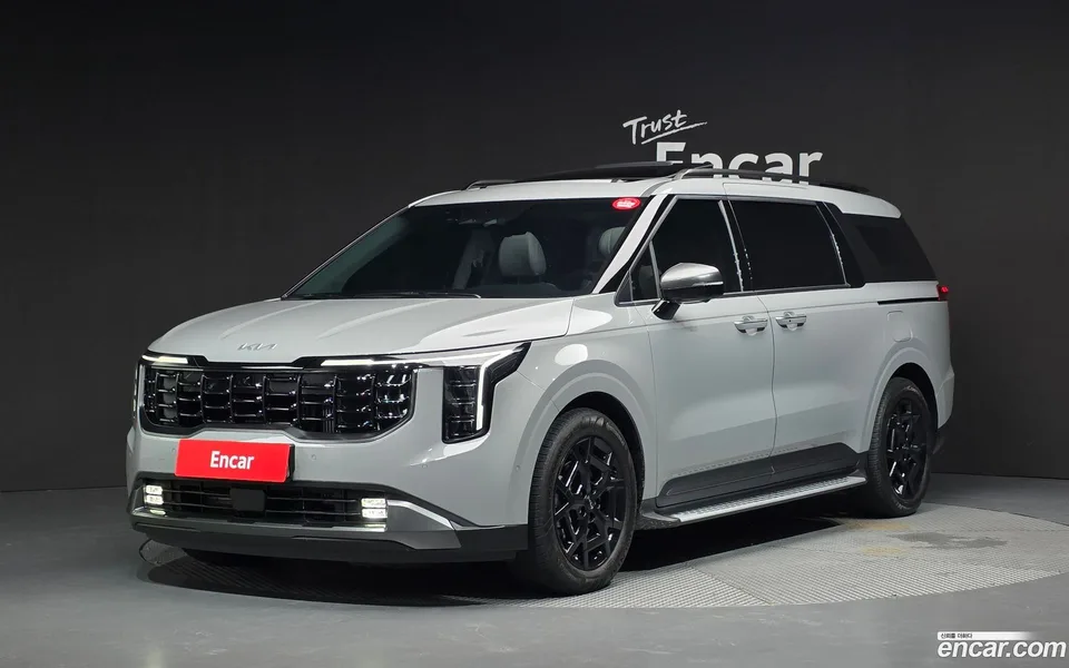 Kia Carnival HEV 7 2024 — photo 1, buy with delivery to Moscow