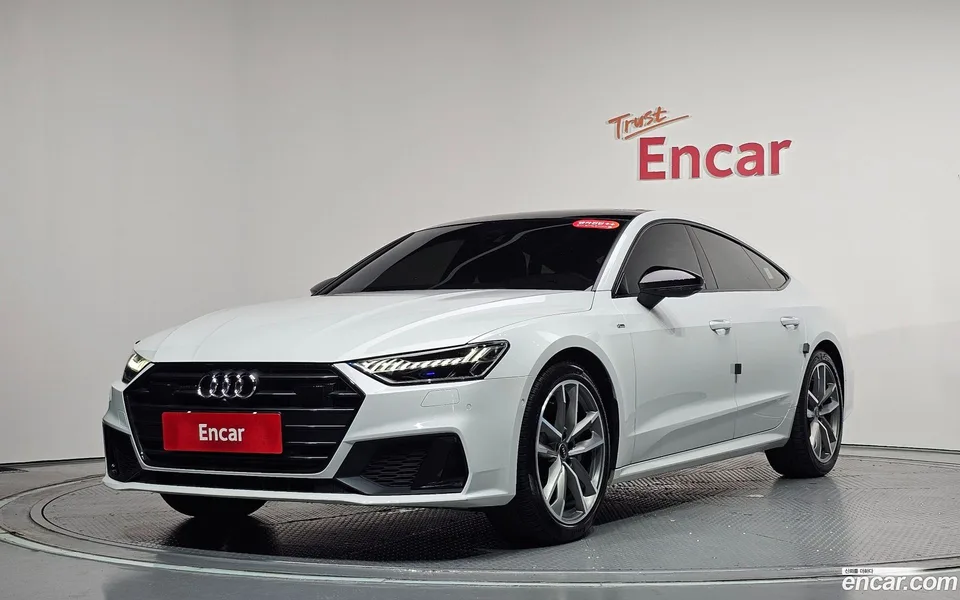 Audi A7 (4K) 55 TFSI 2023 — photo 1, buy with delivery to Moscow