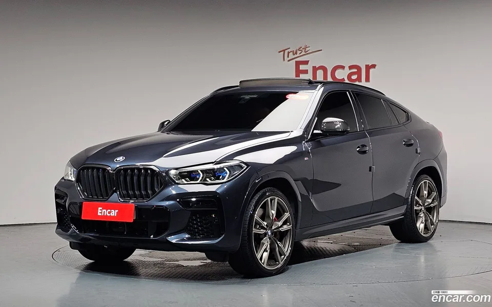 BMW X6 M50i 2022 — photo 1, buy with delivery to Moscow