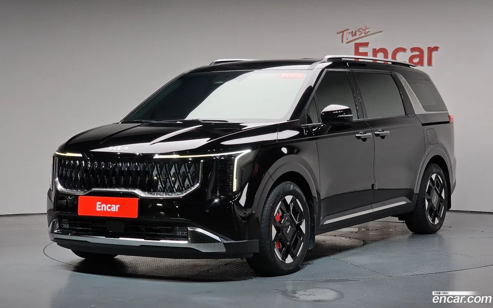 Kia Carnival HEV 7 2025 — photo 1, buy with delivery to Moscow