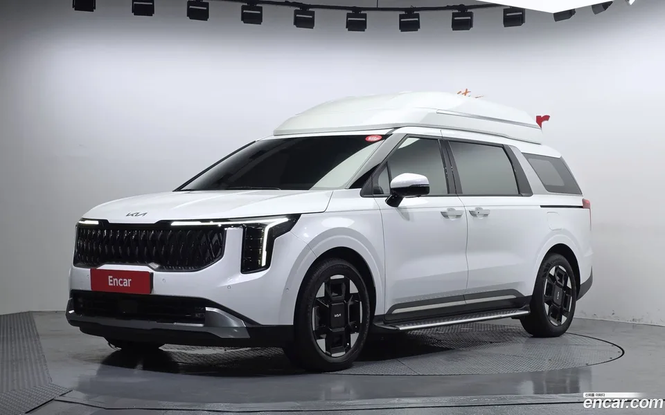 Kia Carnival HEV 9 2024 — photo 1, buy with delivery to Moscow