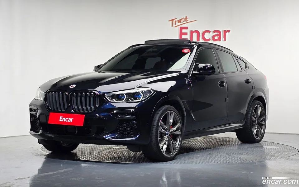 BMW X6 M50i 2022 — photo 1, buy with delivery to Moscow