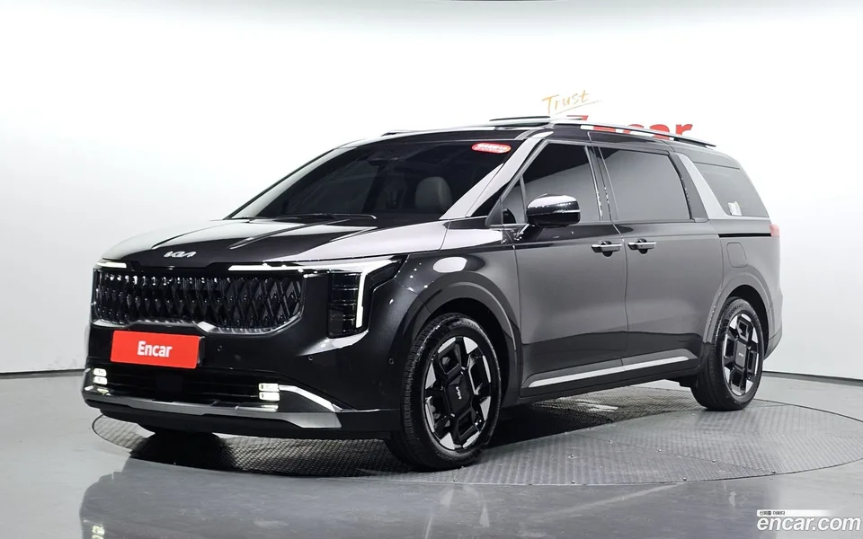 Kia Carnival HEV 7 2024 — photo 1, buy with delivery to Moscow