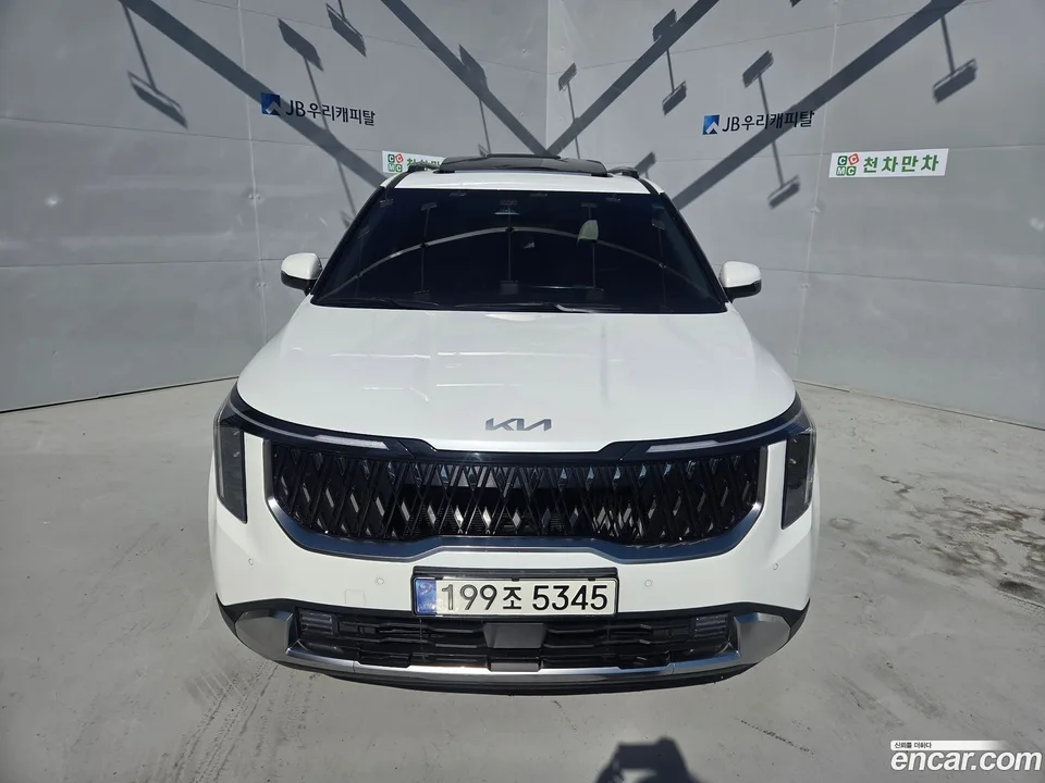 Kia Carnival HEV 9 2024 — photo 1, buy with delivery to Moscow