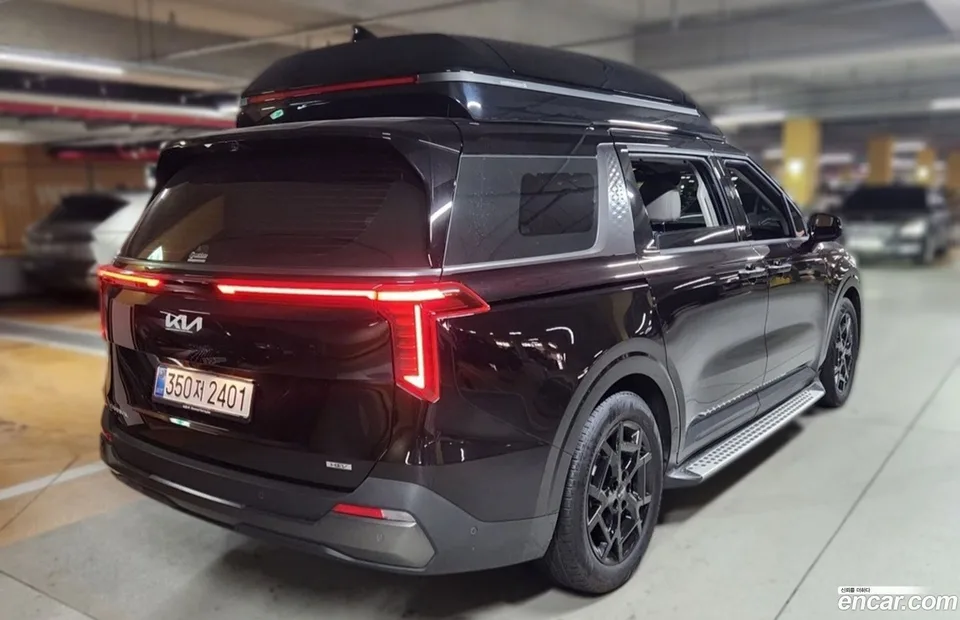 Kia Carnival HEV 7 2025 — photo 1, buy with delivery to Moscow